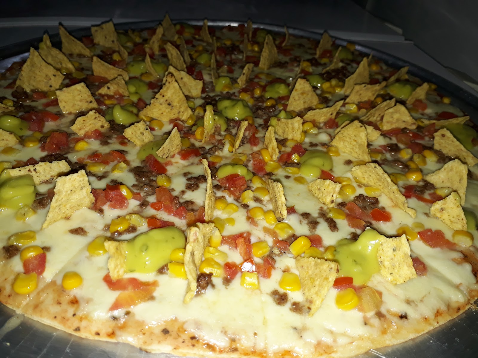 Ricas Arepas y Pizzas