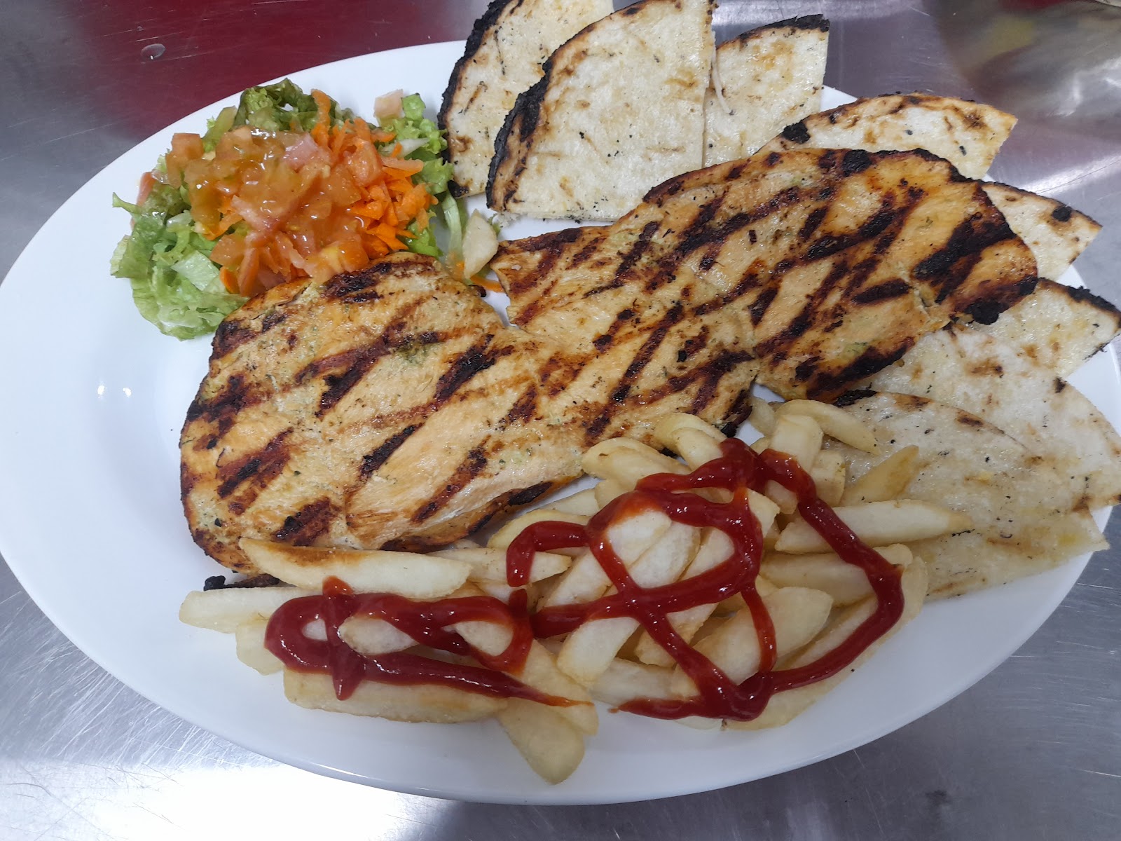 Nico sazón y parrilla.