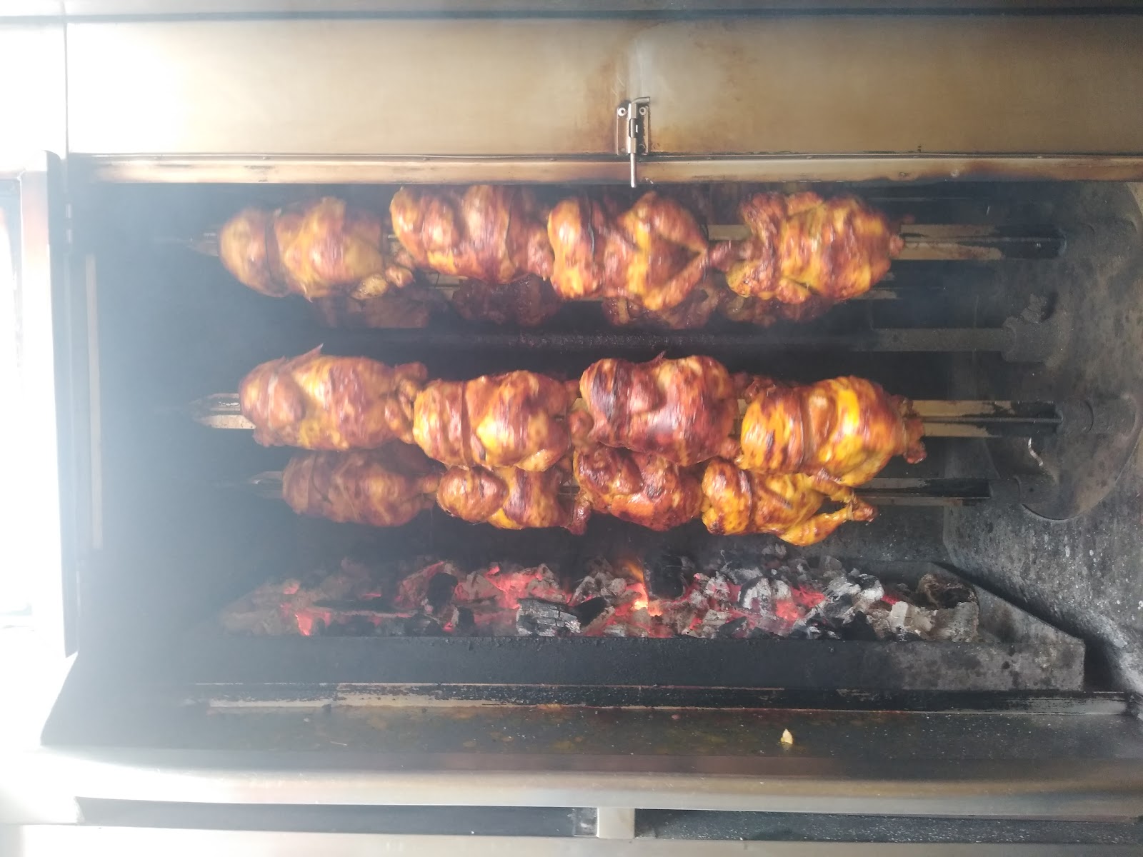 Pollos a La Brasa Mario Santa Gema